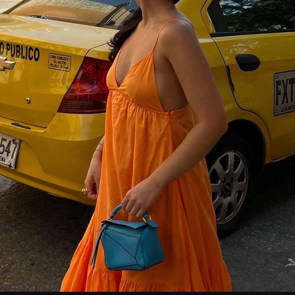 Sleeveless Orange Sundress with Plunging V-Neck